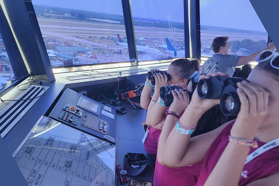 eaa girlventure attendees in airport tower during airventure