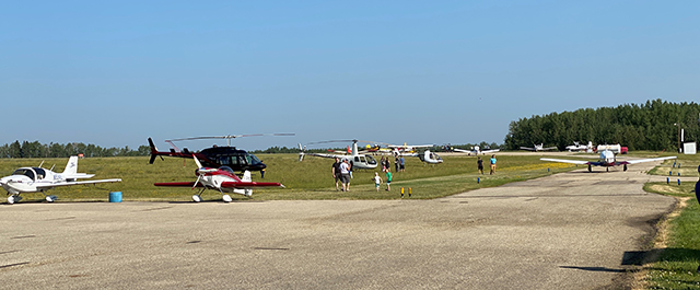 Central Alberta Air Tour - Arriving aircraft limned up and some with overhead propellers