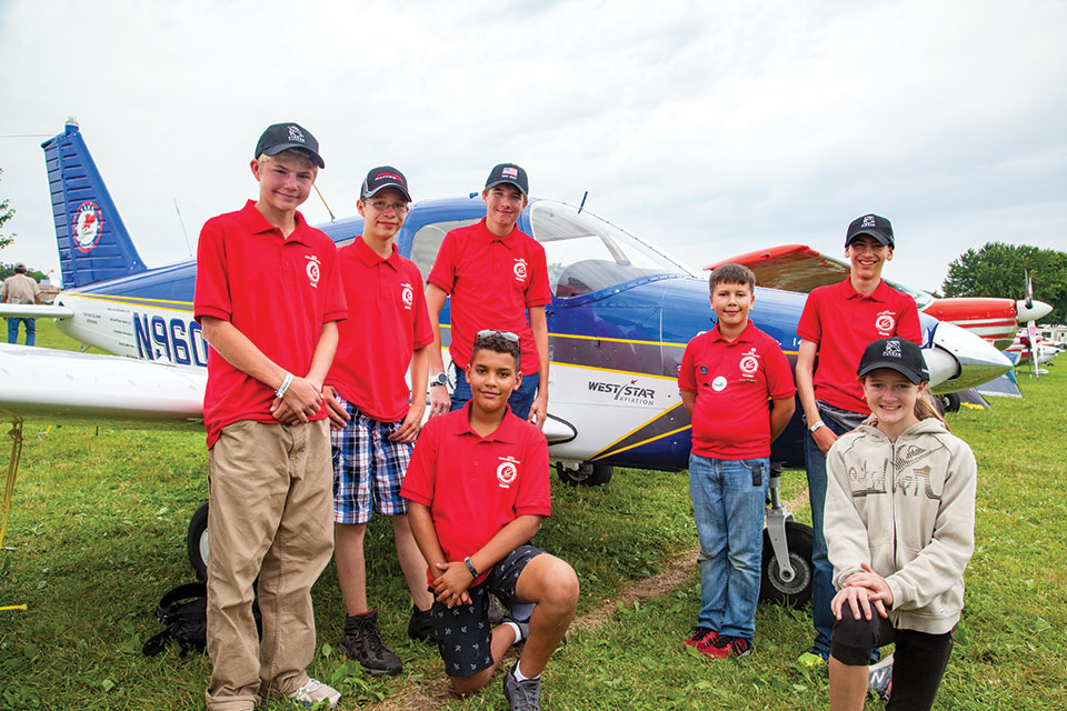 HAWK Youths Arrive in Aircraft They Restored